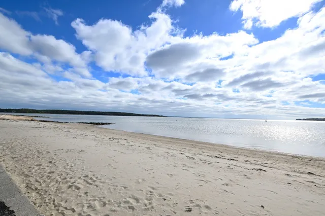 a view of beach and city