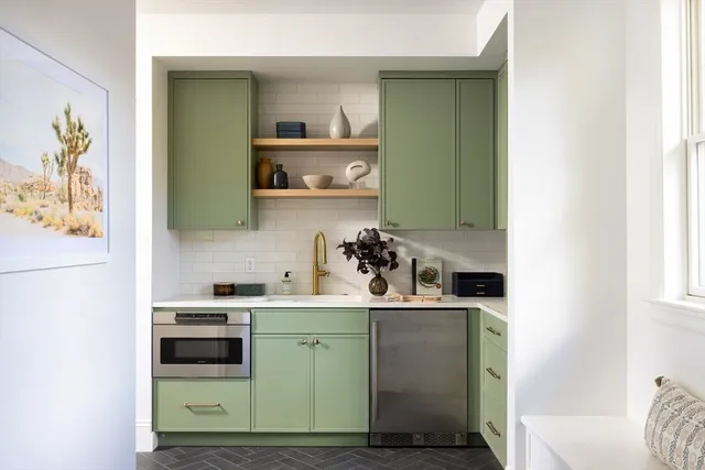 a room with a cabinets and a wooden floor