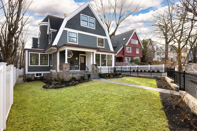 a swimming pool with outdoor seating and yard