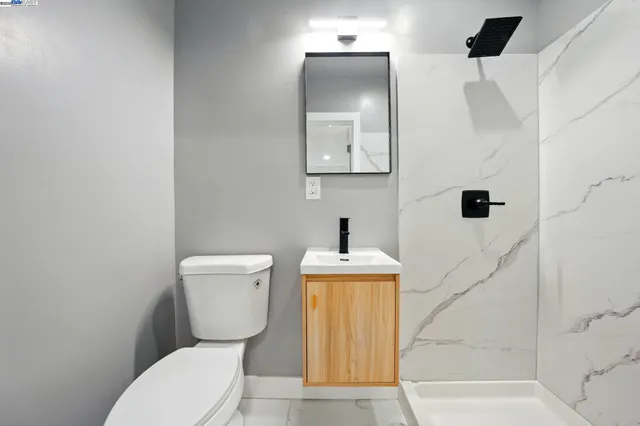 a workspace room with furniture and wooden floor