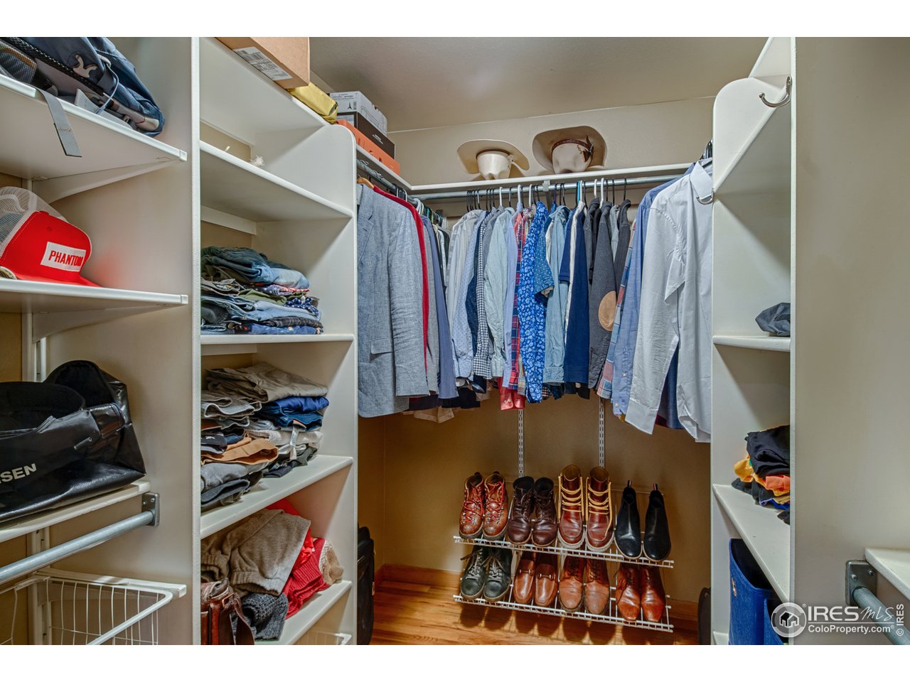 112 Bow Mountain Road Boulder, CO 80304 - Photo 27 of 40 a view of walk in closet with clothes and shoes