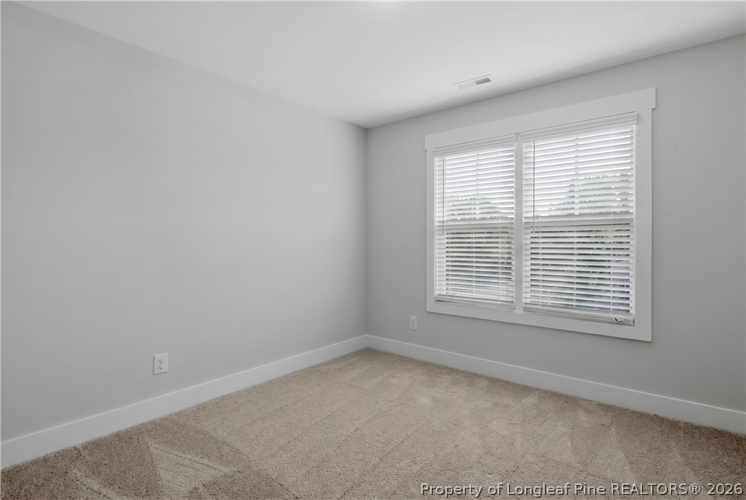 3931 Hamilton Street Hope Mills, NC 28348 - Photo 44 of 50 a view of an empty room with a window