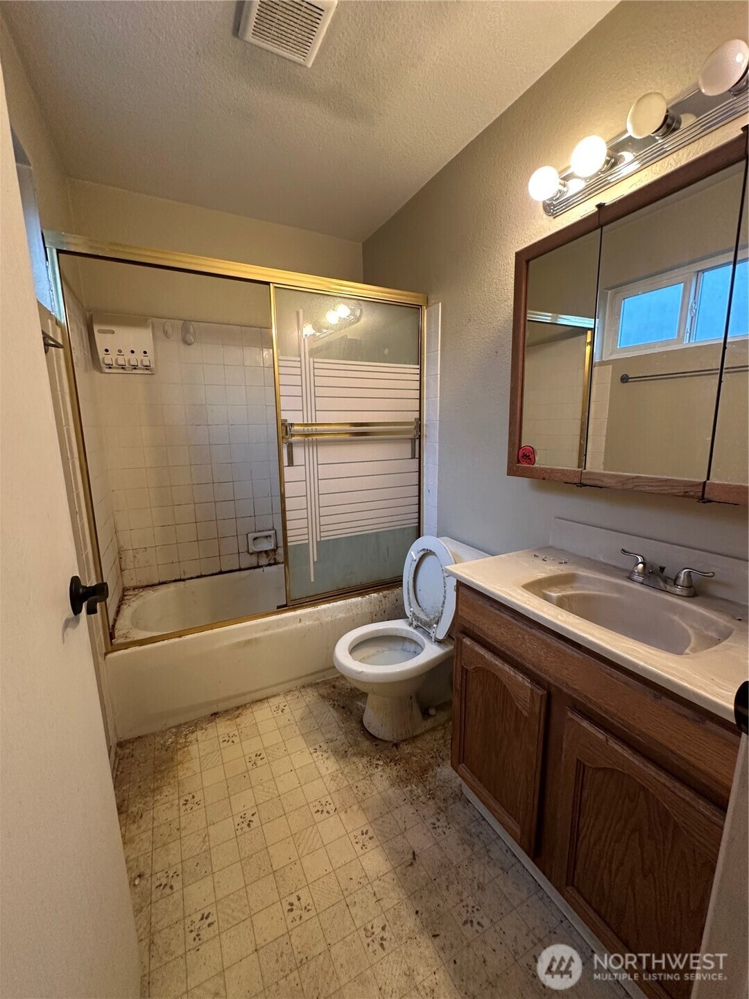 15210 Macadam Road South, Unit D301 Tukwila, WA 98188 - Photo 11 of 12 a bathroom with a sink toilet and shower