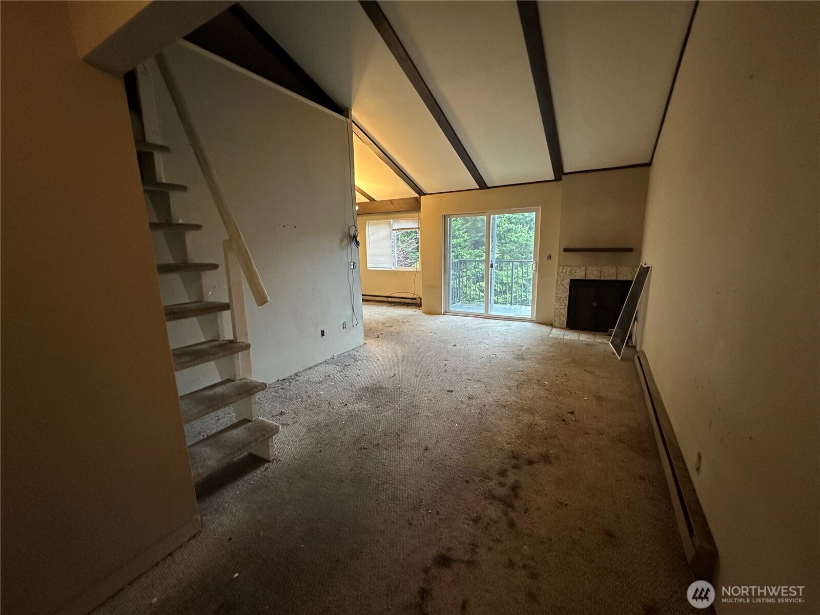 15210 Macadam Road South, Unit D301 Tukwila, WA 98188 - Photo 2 of 12 wooden floor in an empty room with a fireplace