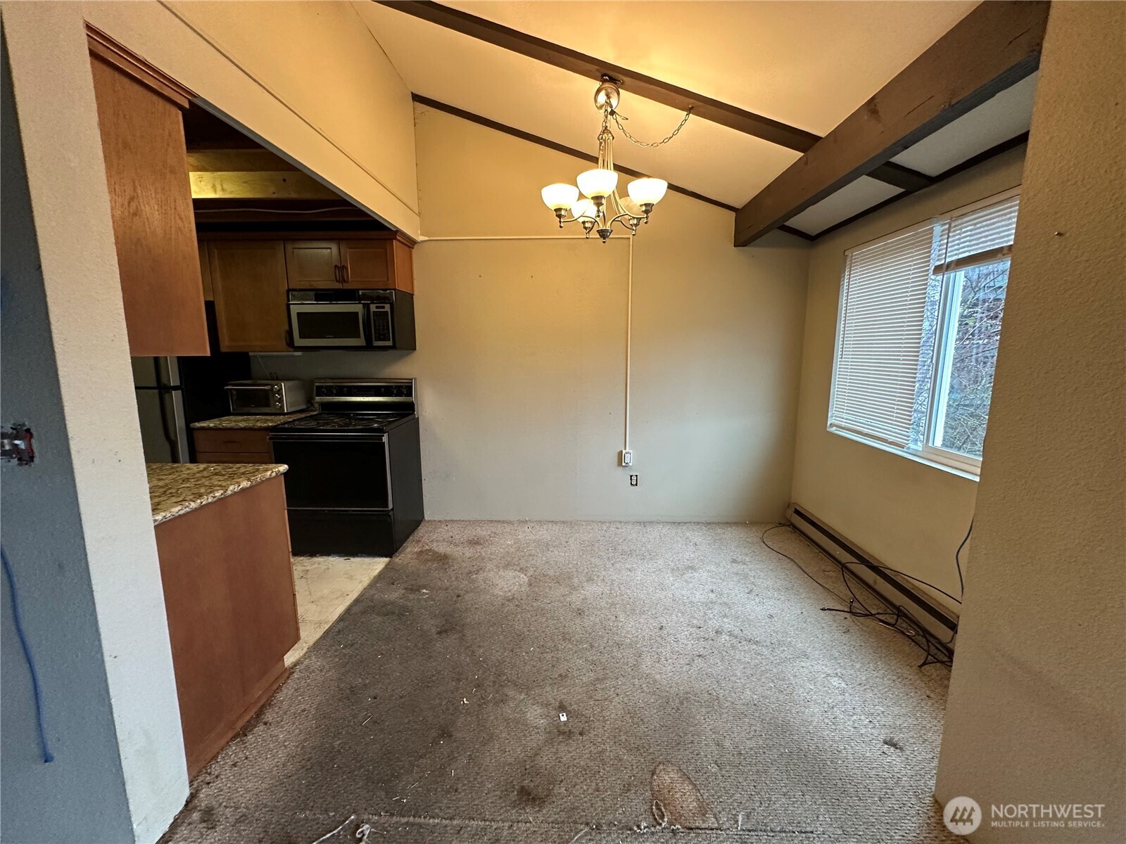 15210 Macadam Road South, Unit D301 Tukwila, WA 98188 - Photo 4 of 12 a view of a kitchen with electric appliances