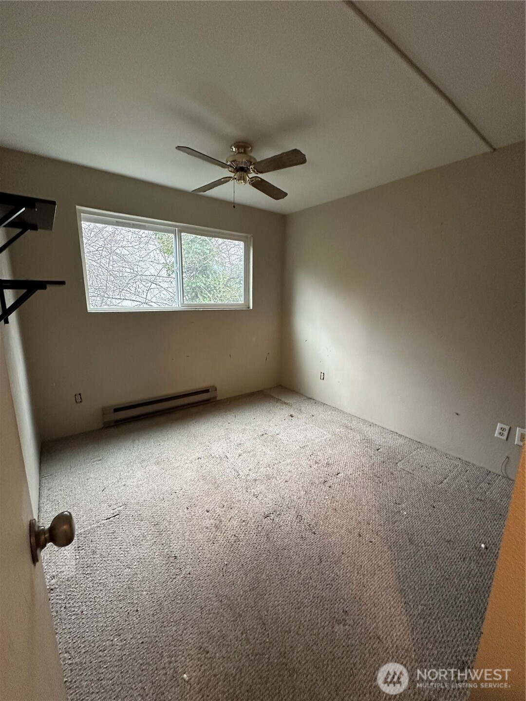 15210 Macadam Road South, Unit D301 Tukwila, WA 98188 - Photo 7 of 12 a view of an empty room with a window