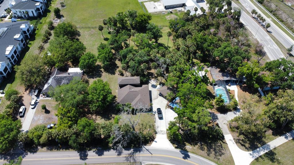 6480 Richardson Road Sarasota, FL 34240 - Photo 3 of 6 an aerial view of a house with outdoor space