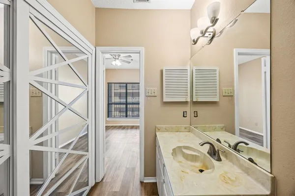 a bathroom with a sink and a bathtub