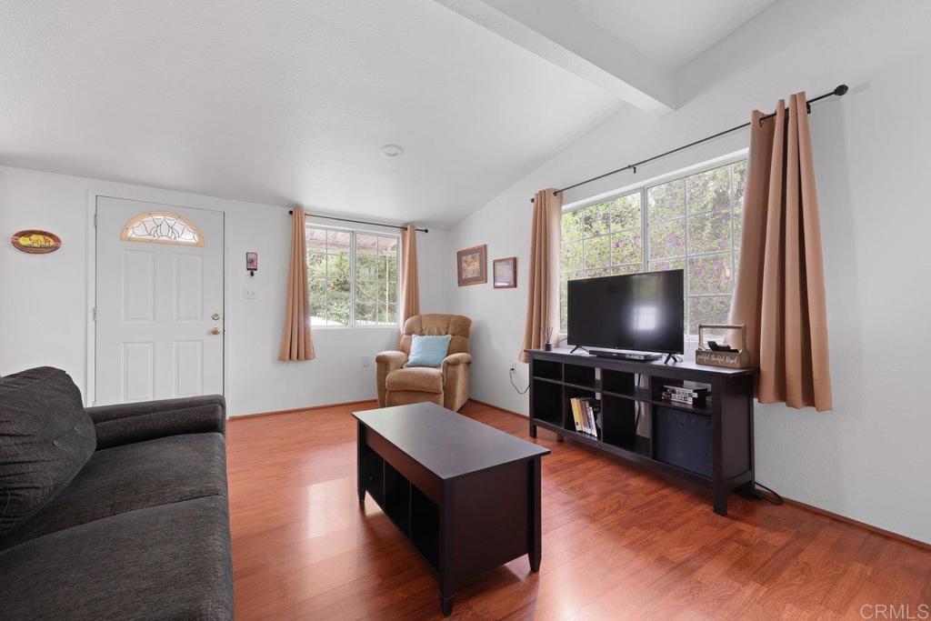 8968 Lakeview Road Lakeside, CA 92040 - Photo 11 of 30 a living room with furniture and a flat screen tv