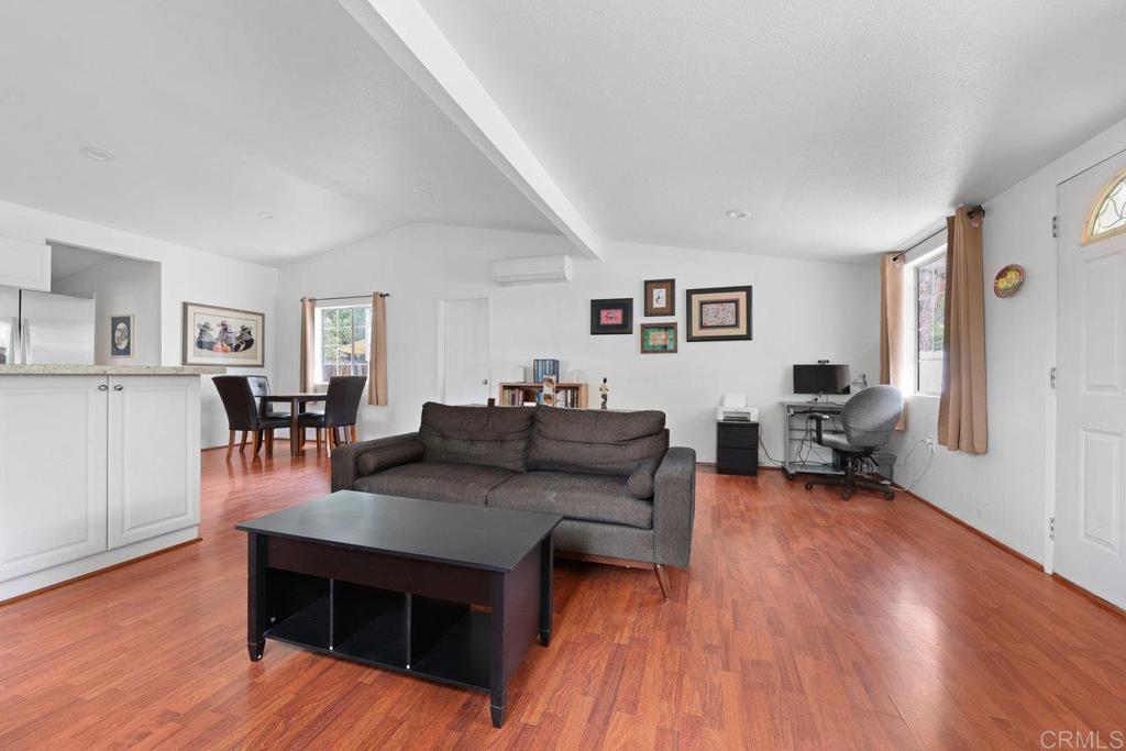 8968 Lakeview Road Lakeside, CA 92040 - Photo 12 of 30 a living room with furniture and a wooden floor