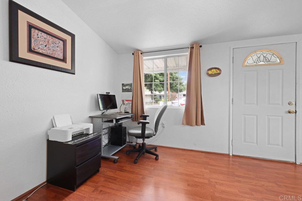 8968 Lakeview Road Lakeside, CA 92040 - Photo 13 of 30 a view of a workspace with furniture and a window