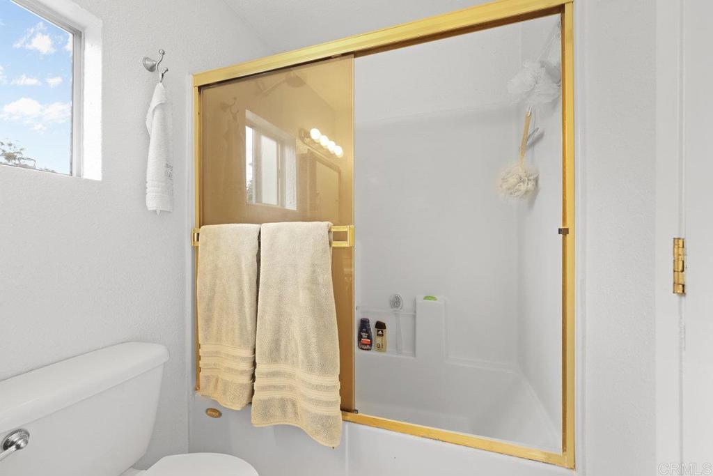 8968 Lakeview Road Lakeside, CA 92040 - Photo 27 of 30 a bathroom with a shower and a toilet