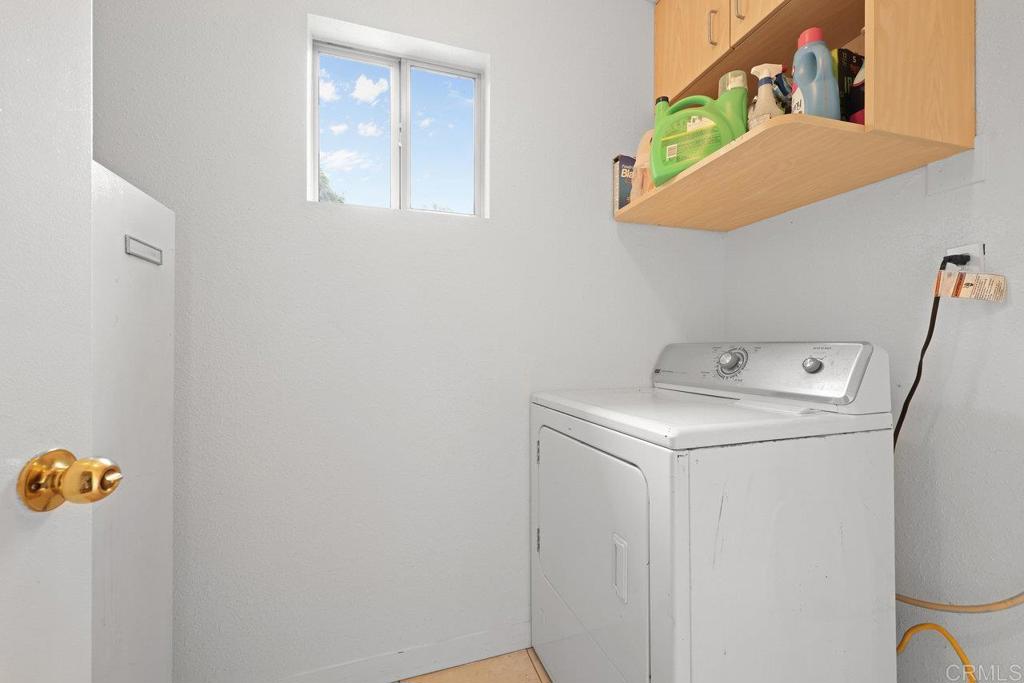8968 Lakeview Road Lakeside, CA 92040 - Photo 28 of 30 a utility room with dryer and washer