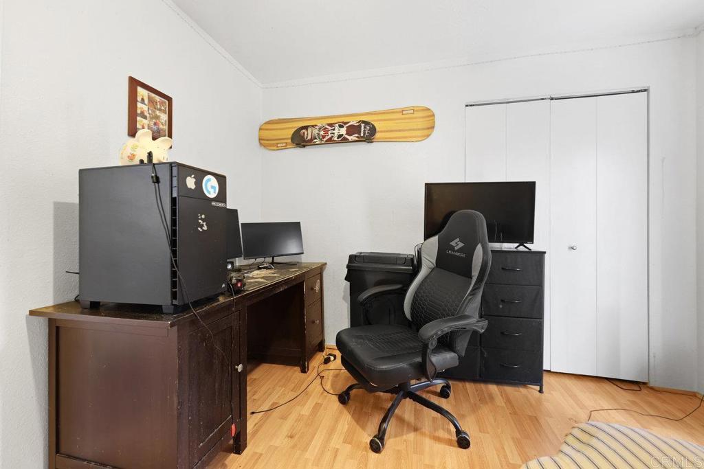 8968 Lakeview Road Lakeside, CA 92040 - Photo 30 of 30 a view of workspace with stainless steel appliances wooden floor