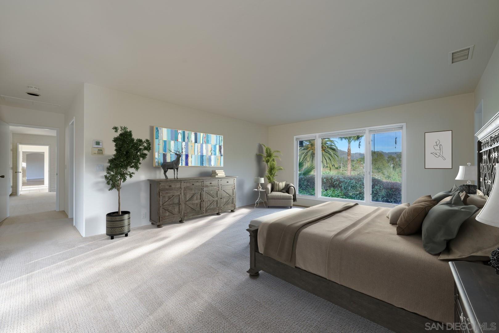 6531 Lago Lindo Rancho Santa Fe, CA 92067 - Photo 11 of 54 a bedroom with a bed and window