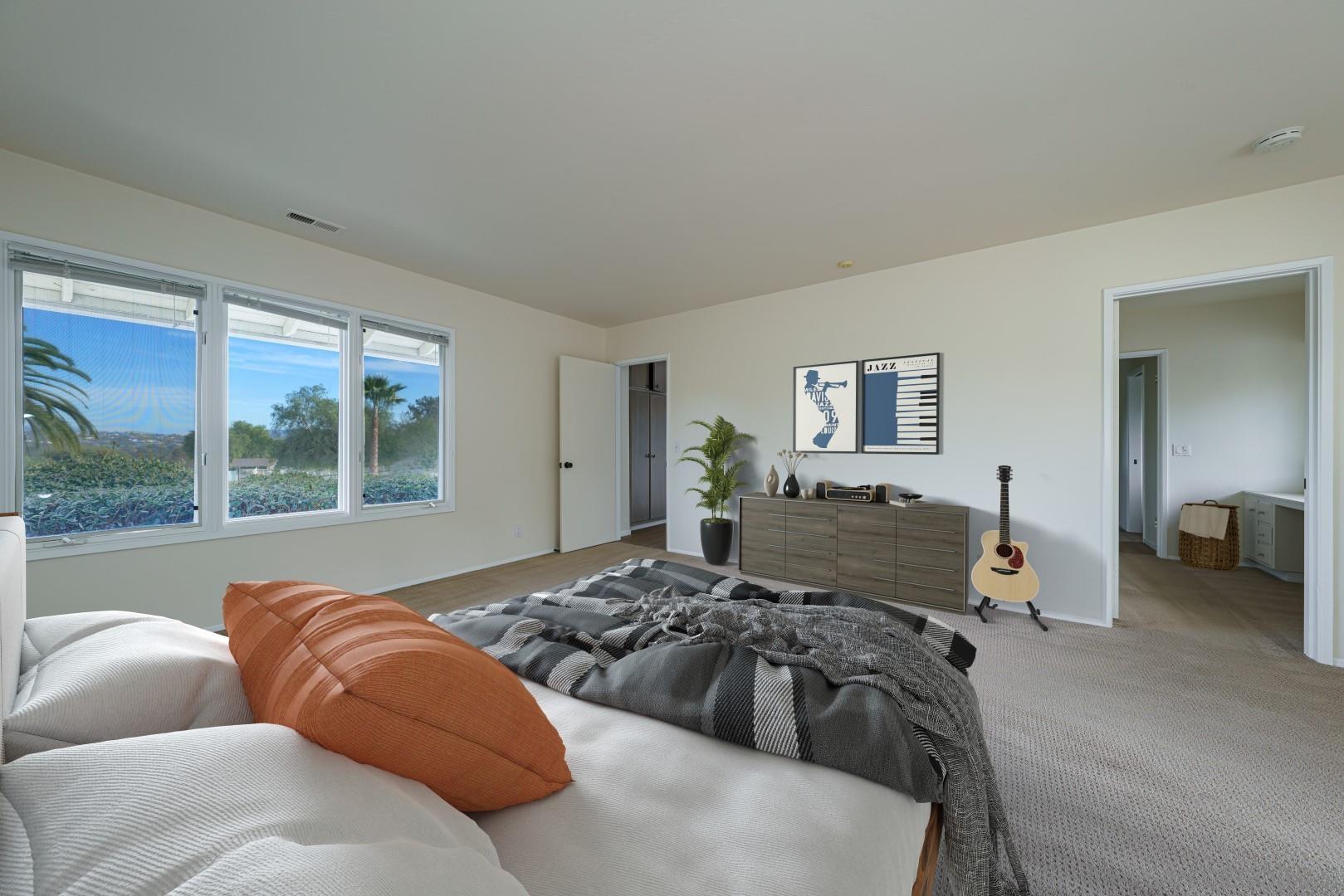 6531 Lago Lindo Rancho Santa Fe, CA 92067 - Photo 15 of 54 a bedroom with a large bed and a large window