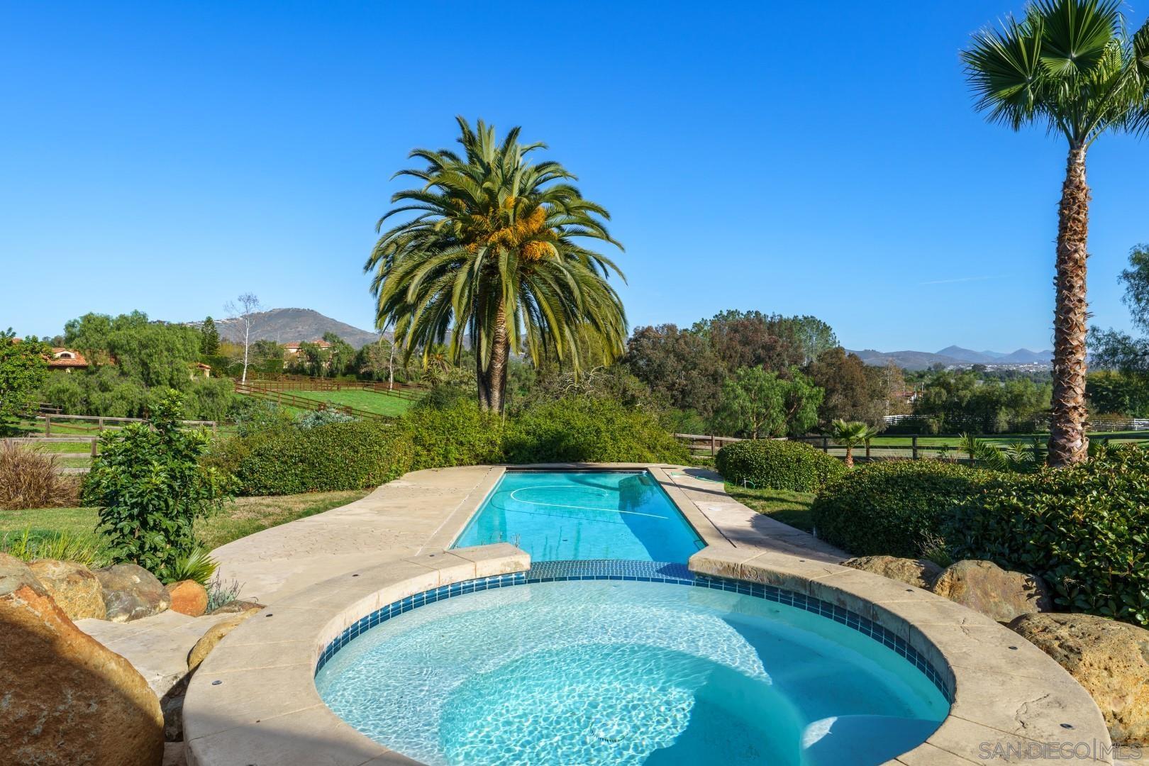 6531 Lago Lindo Rancho Santa Fe, CA 92067 - Photo 19 of 54 a view of swimming pool and lake view