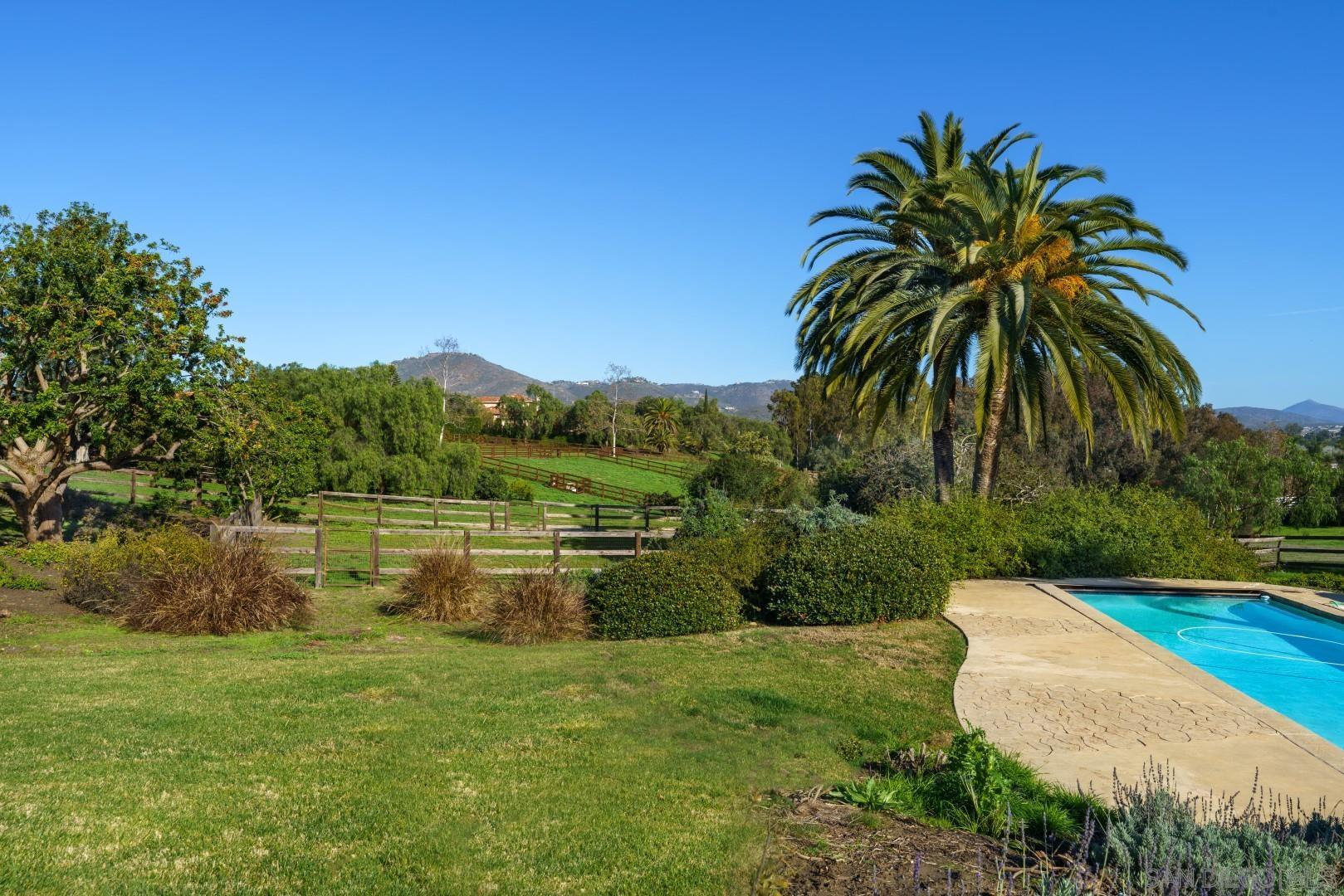 6531 Lago Lindo Rancho Santa Fe, CA 92067 - Photo 21 of 54 a view of a lake view with a garden