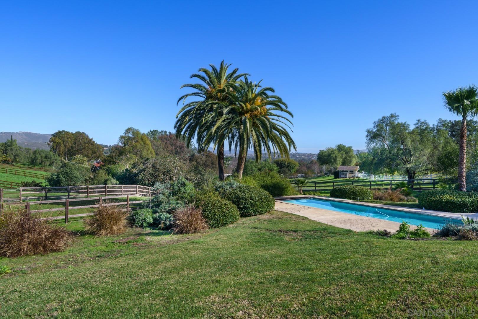 6531 Lago Lindo Rancho Santa Fe, CA 92067 - Photo 23 of 54 a view of swimming pool with a yard