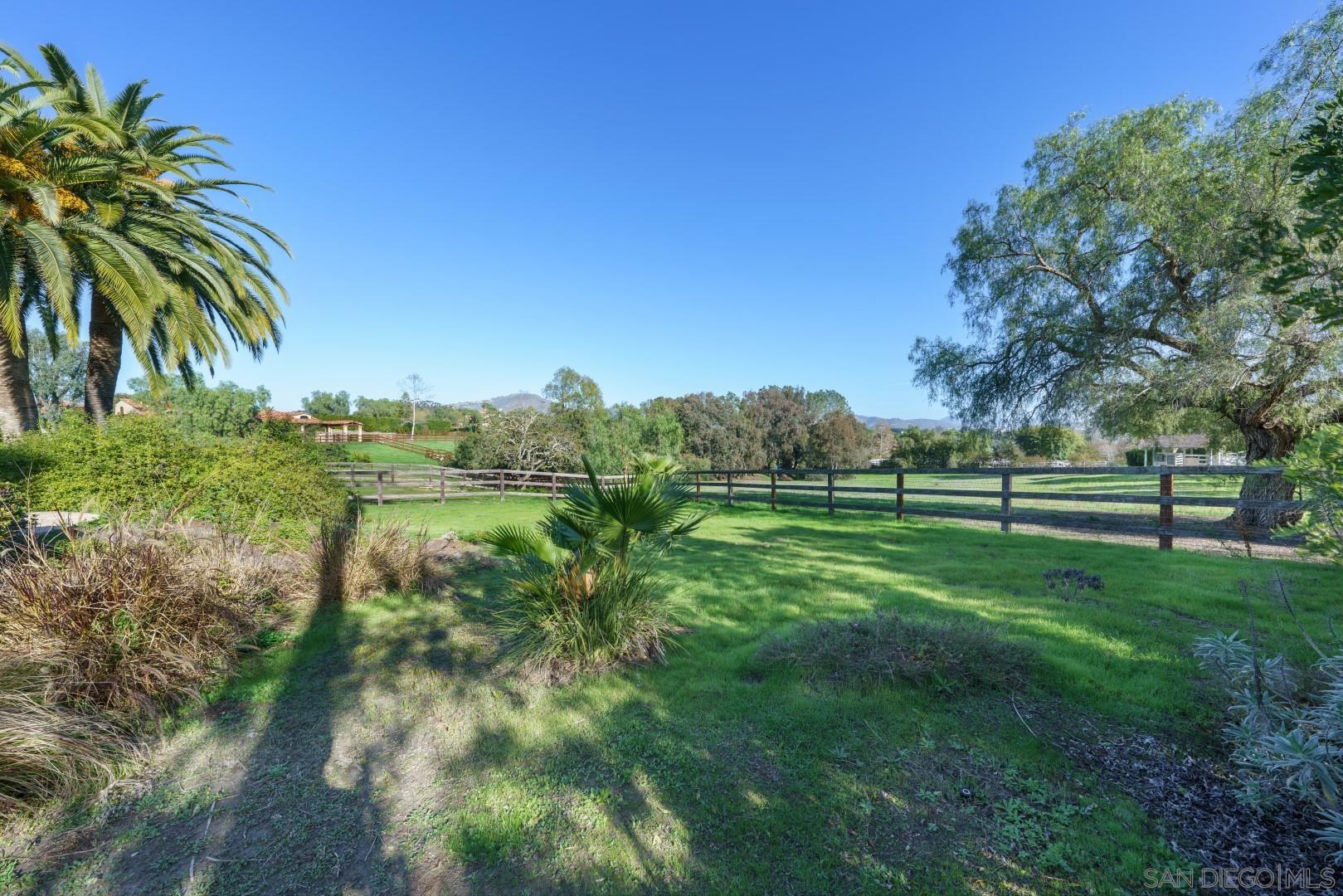 6531 Lago Lindo Rancho Santa Fe, CA 92067 - Photo 30 of 54 a view of green field with trees