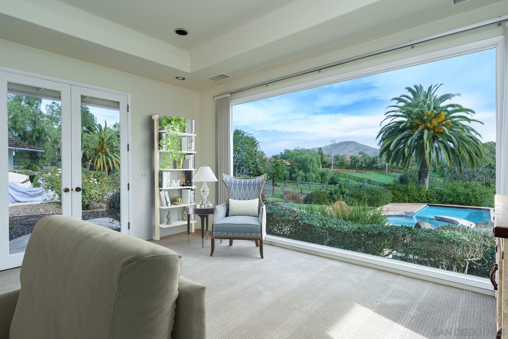 6531 Lago Lindo Rancho Santa Fe, CA 92067 - Photo 5 of 54 a balcony with furniture and a garden