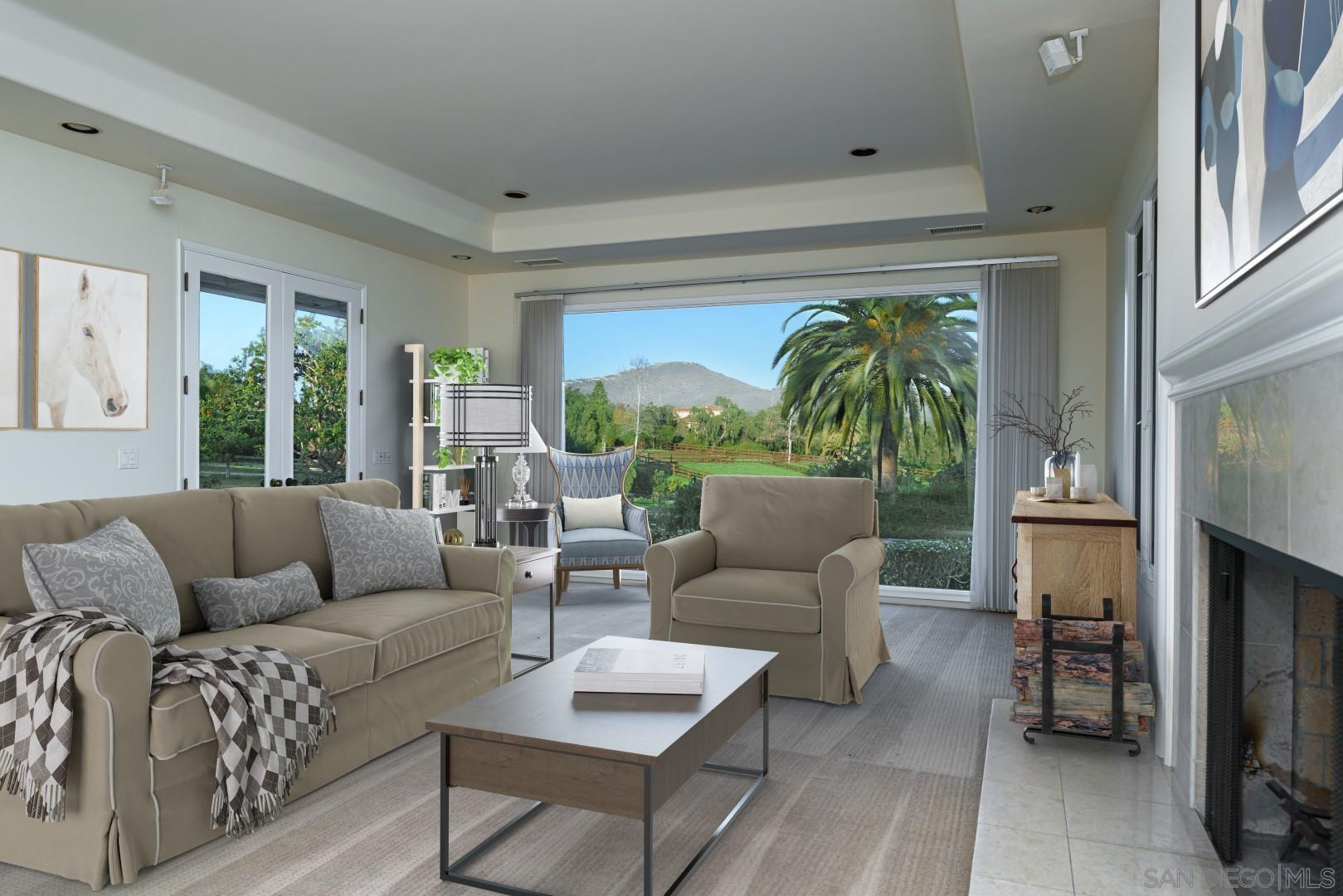 6531 Lago Lindo Rancho Santa Fe, CA 92067 - Photo 6 of 54 a living room with furniture and a large window