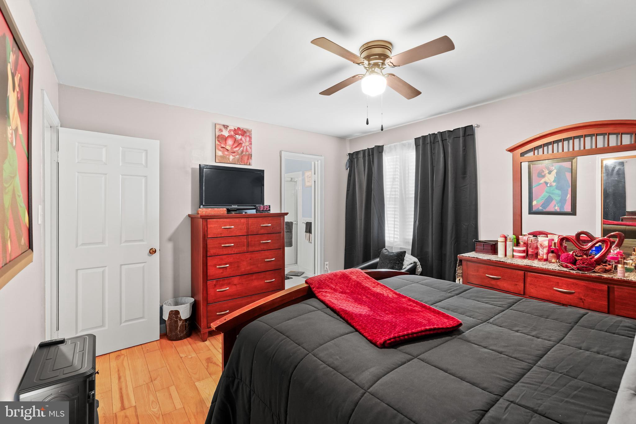 5210 Vienna Drive Clinton, MD 20735 - Photo 18 of 29 a bedroom with a bed and a flat screen tv