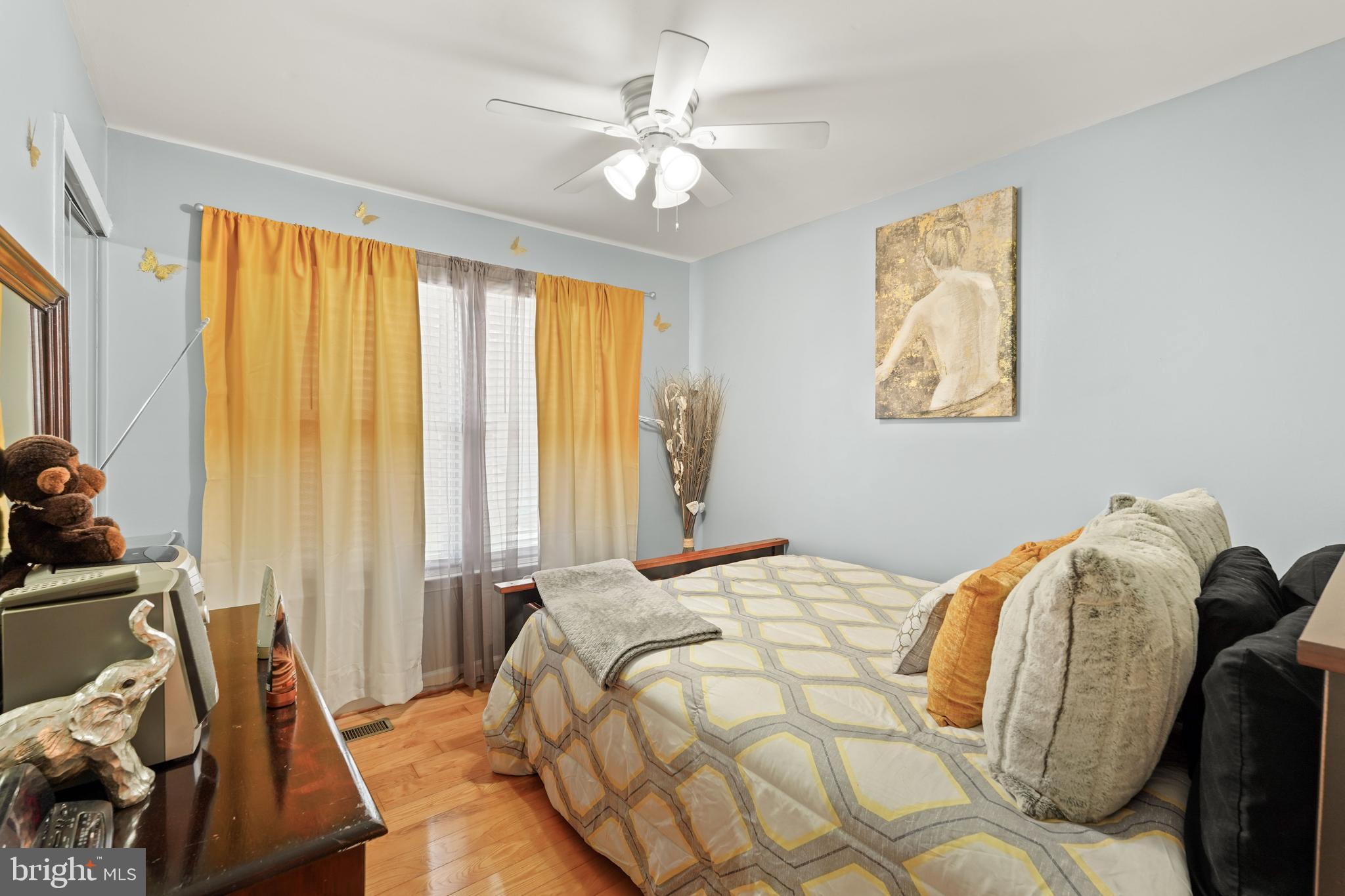 5210 Vienna Drive Clinton, MD 20735 - Photo 21 of 29 a bedroom with a bed and a chandelier