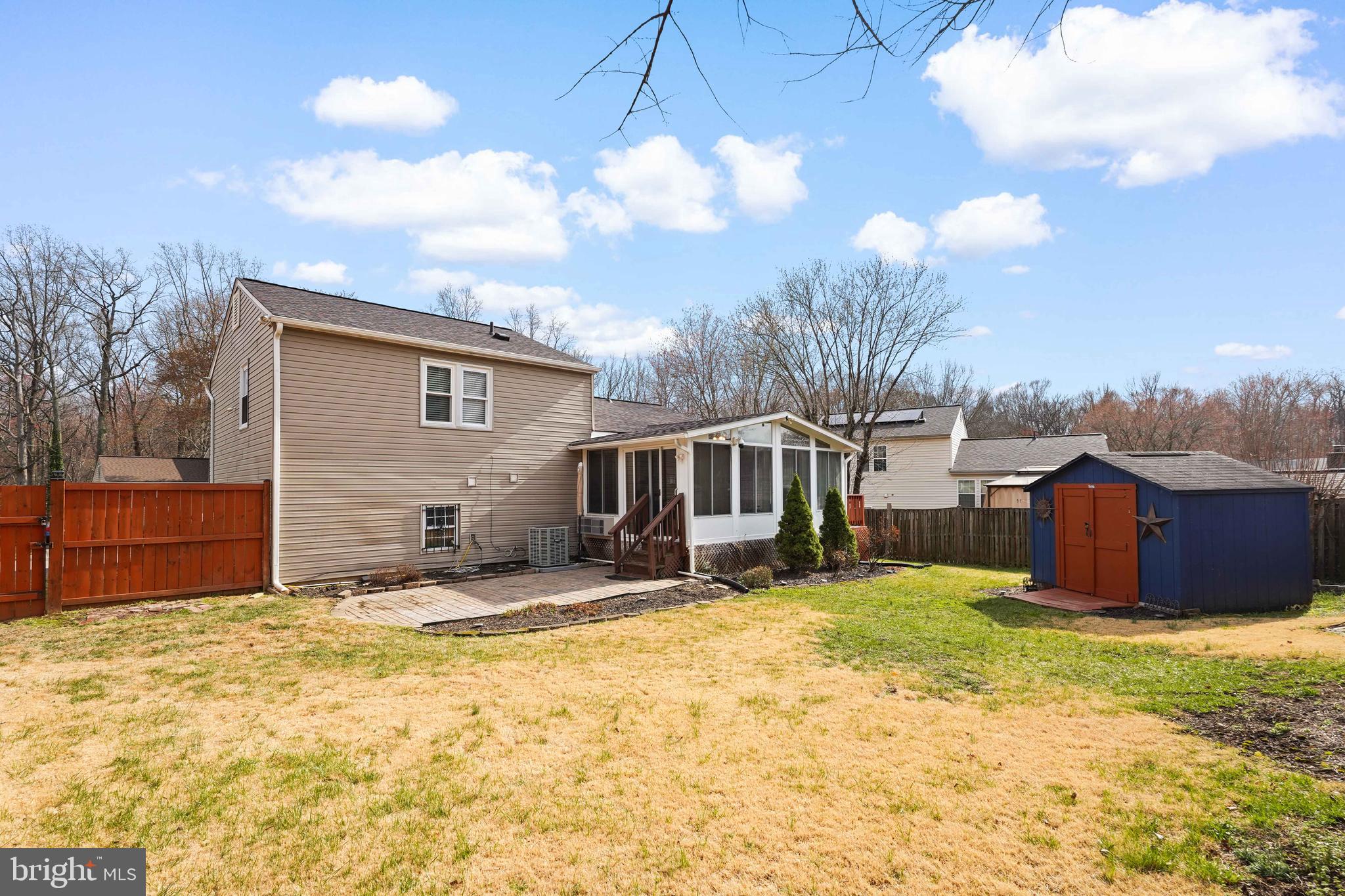 5210 Vienna Drive Clinton, MD 20735 - Photo 28 of 29 a view of a house with backyard and sitting area