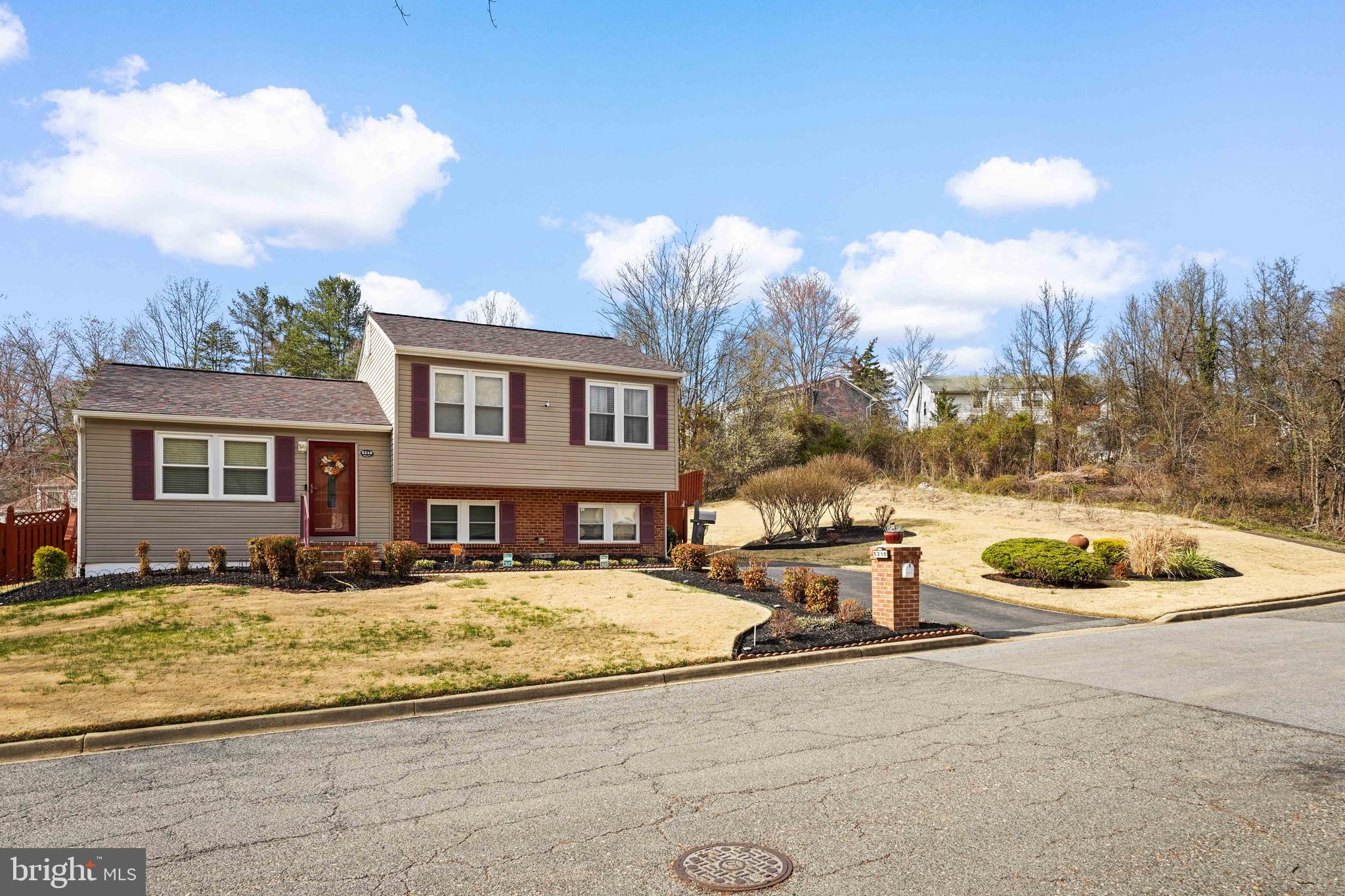 5210 Vienna Drive Clinton, MD 20735 - Photo 5 of 29 a view of a house with a snow in a yard
