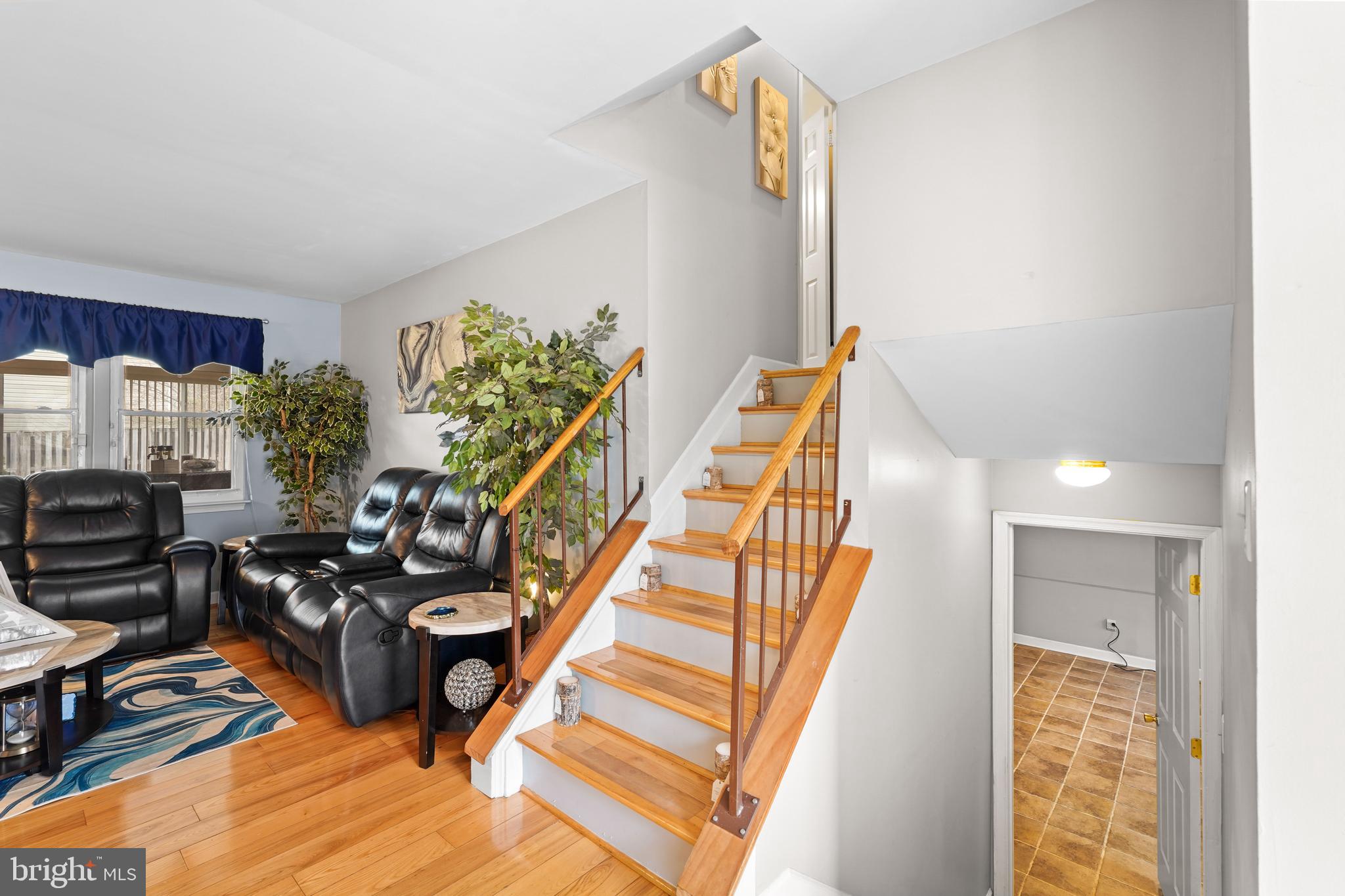 5210 Vienna Drive Clinton, MD 20735 - Photo 6 of 29 a view of entryway and hall with wooden floor