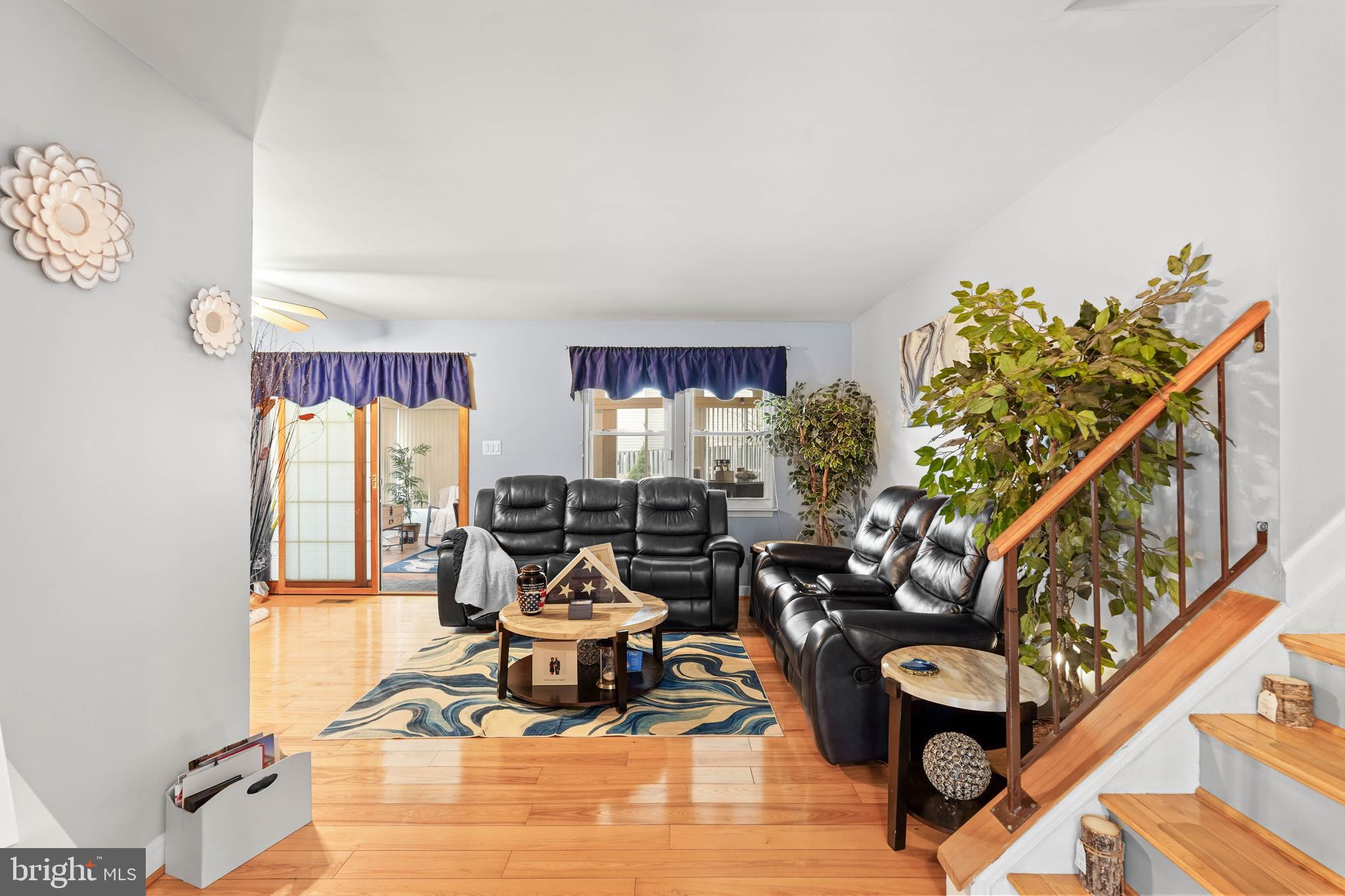 5210 Vienna Drive Clinton, MD 20735 - Photo 7 of 29 a living room with furniture and a potted plant
