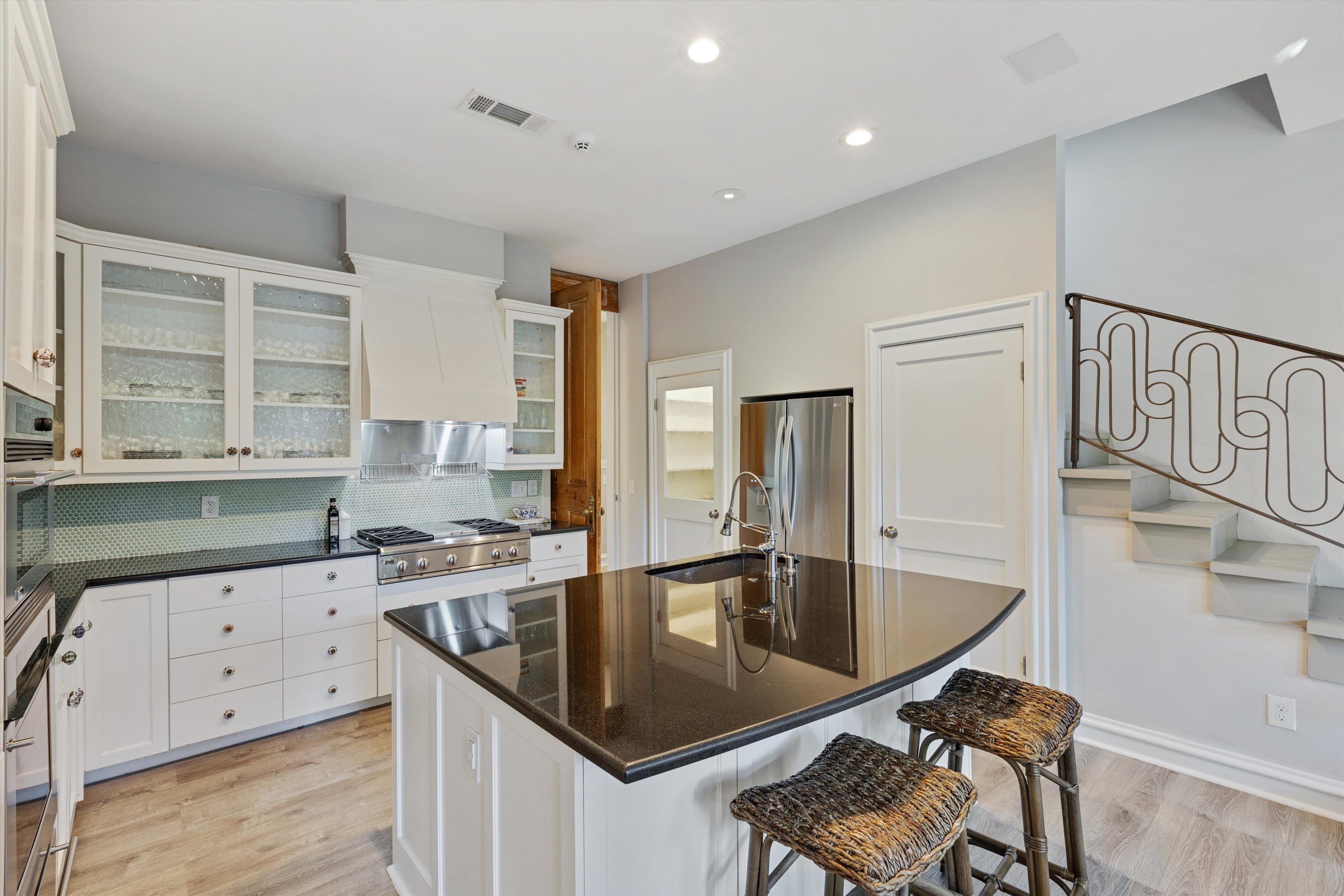 194 South Perkins Road Memphis, TN 38117 - Photo 15 of 33 a kitchen with granite countertop a sink a counter top space and cabinets