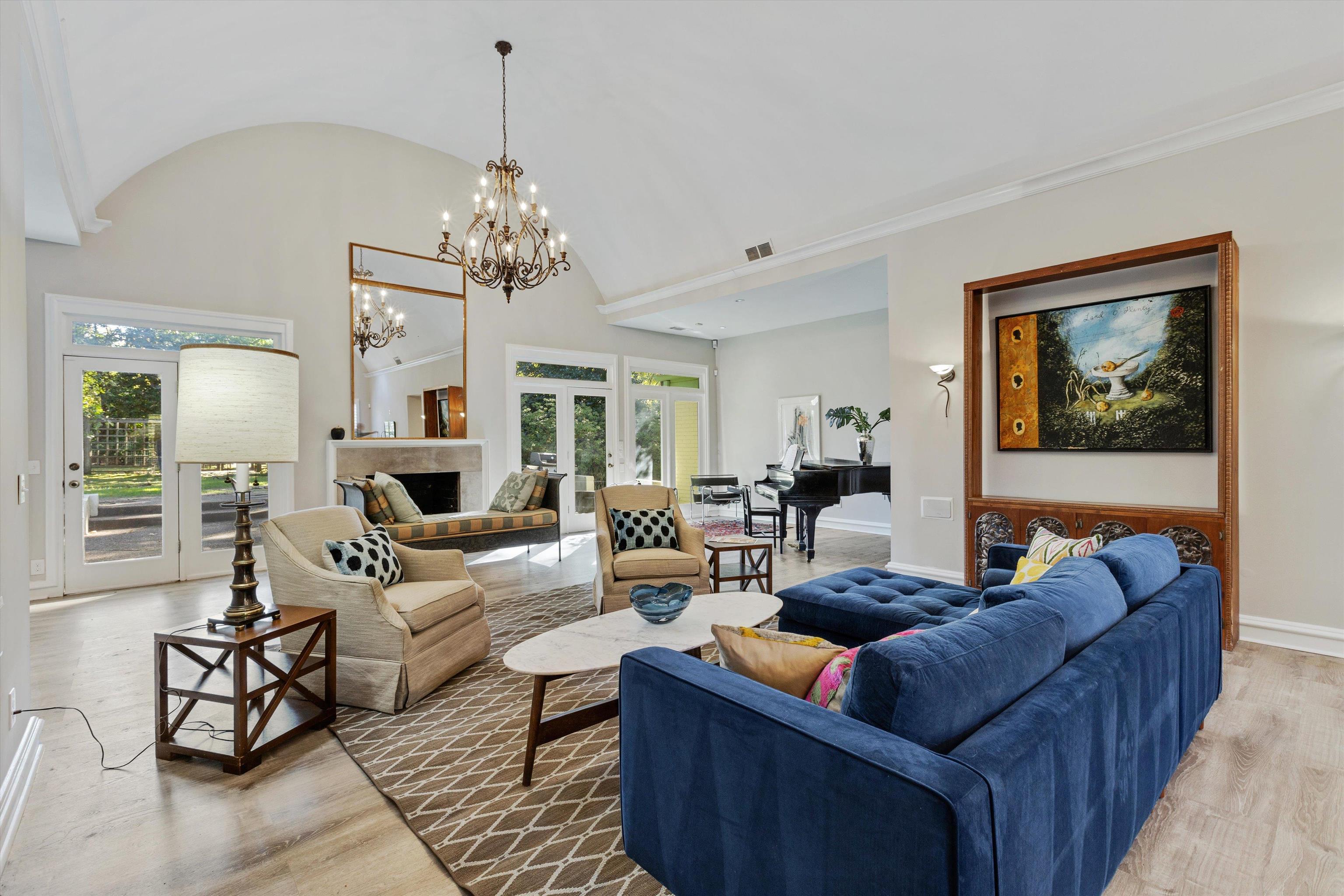194 South Perkins Road Memphis, TN 38117 - Photo 8 of 33 a living room with furniture and a chandelier