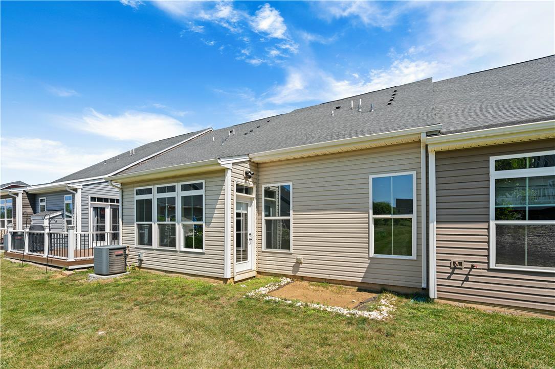 4758 Rafi Road Easton, PA 18045 - Photo 51 of 55 A well-maintained rear facade features ample windows and a private outdoor space.