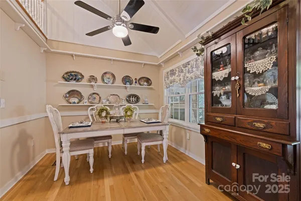 a bedroom with a large bed and a large window