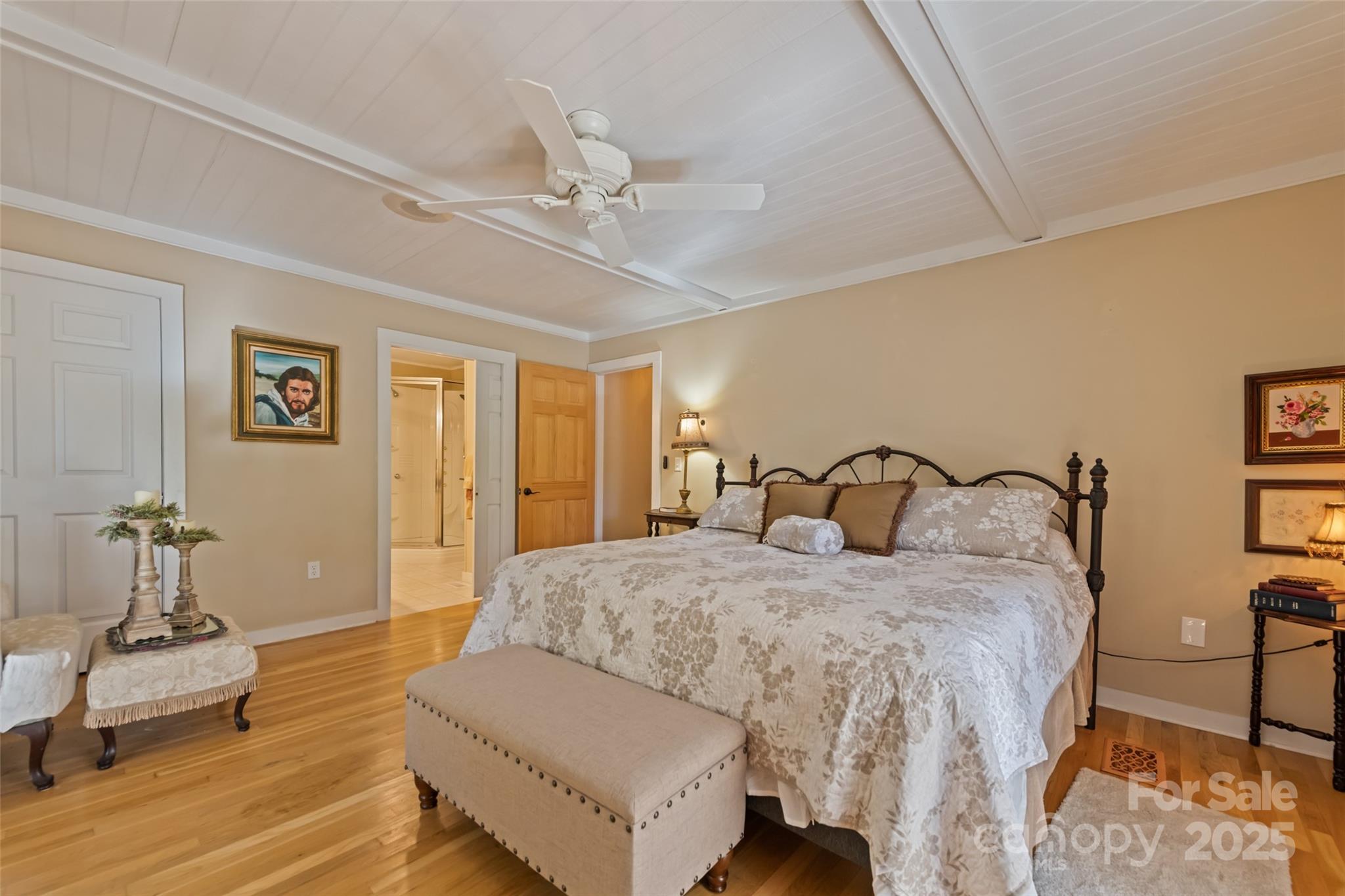 31 Laurel Ridge Drive Otto, NC 28763 - Photo 37 of 48 a bedroom with a bed and wooden floor