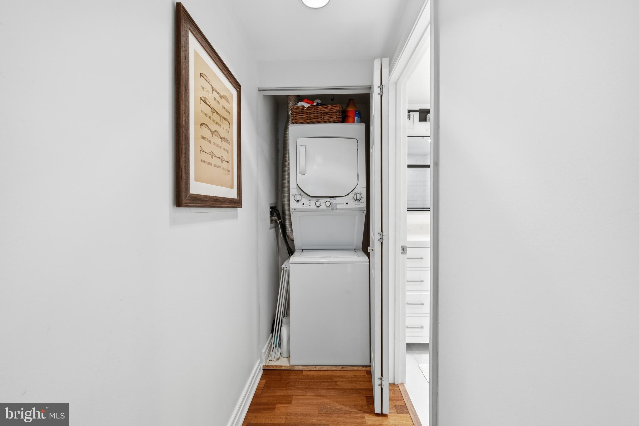 2301 N Street Northwest, Unit 212 Washington, DC 20037 - Photo 15 of 23 a utility room with dryer and washer