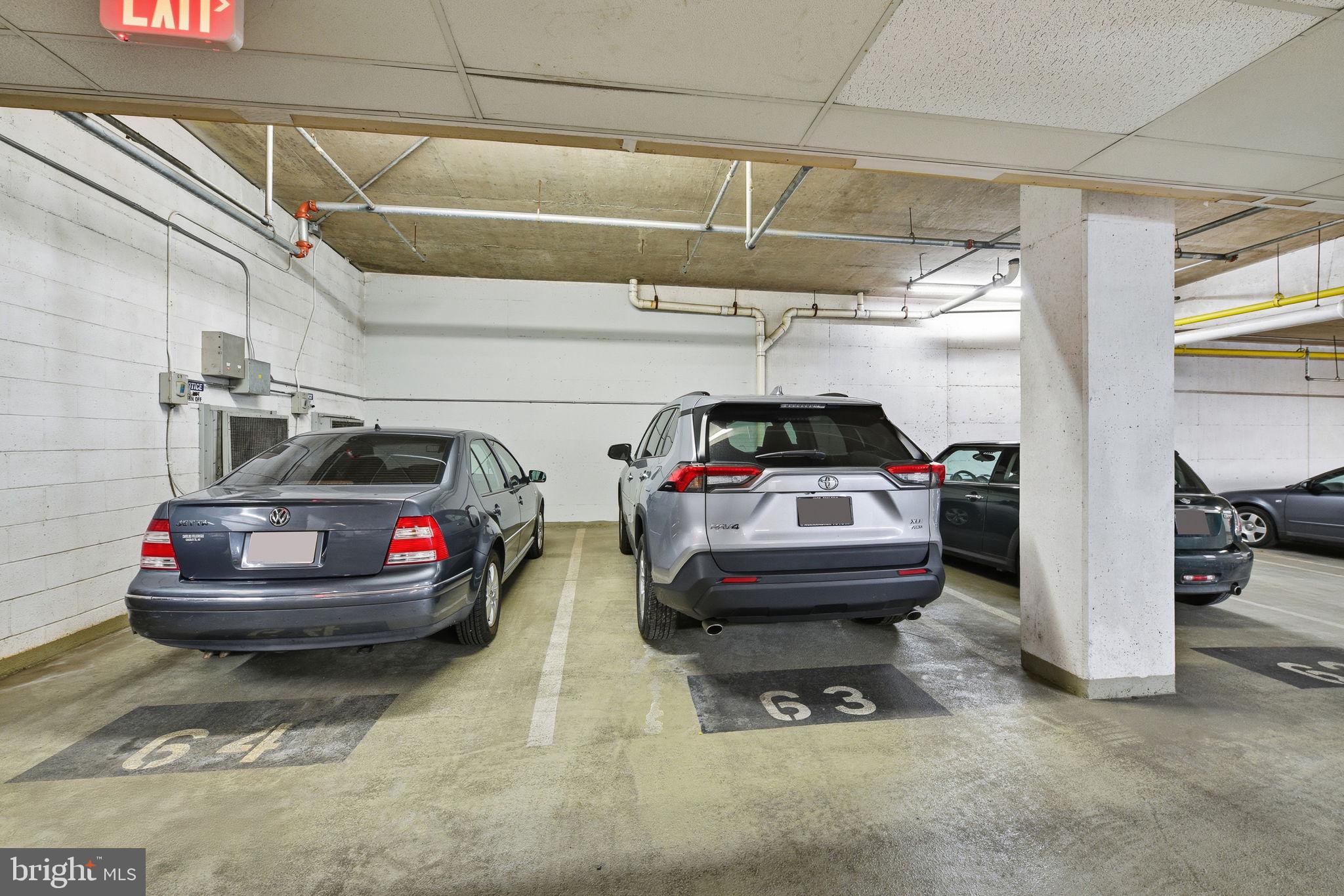2301 N Street Northwest, Unit 212 Washington, DC 20037 - Photo 20 of 23 a view of parking garage with cars parked