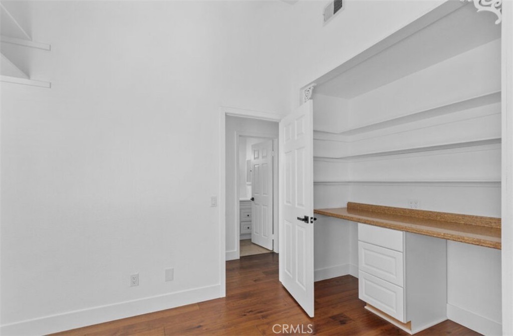 30894 Wellington Circle Temecula, CA 92591 - Photo 20 of 28 a view of walk in closet with empty racks