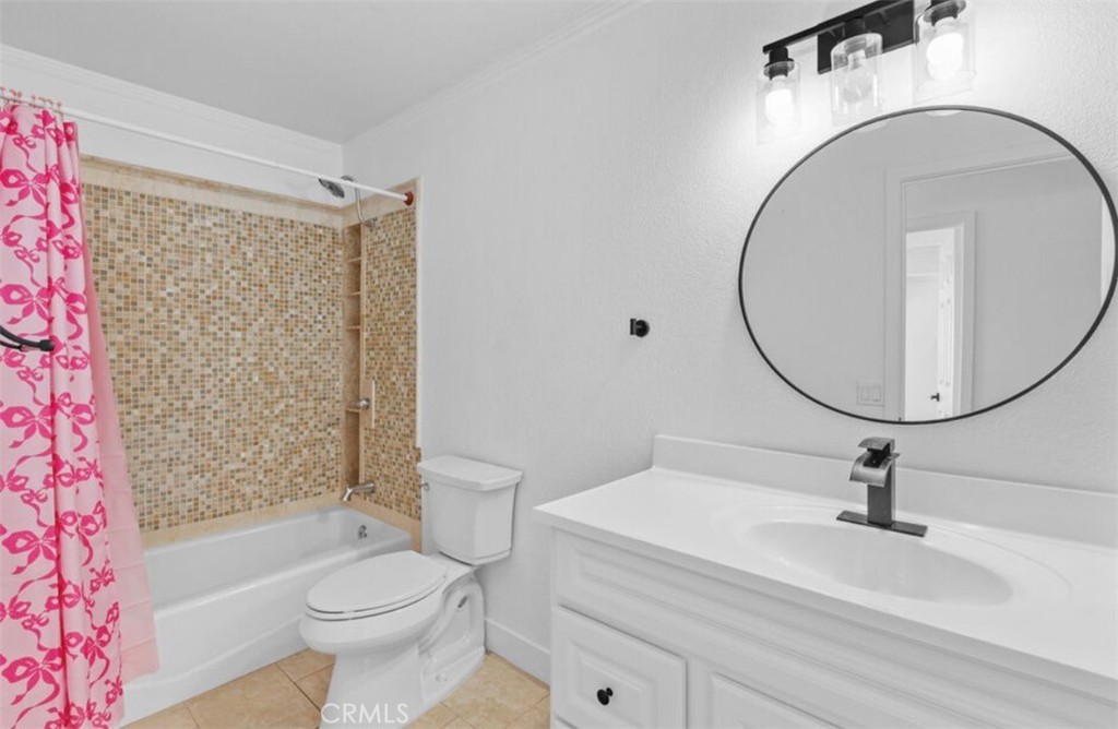 30894 Wellington Circle Temecula, CA 92591 - Photo 22 of 28 a bathroom with a sink toilet and shower