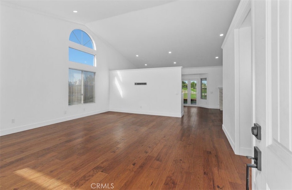 30894 Wellington Circle Temecula, CA 92591 - Photo 4 of 28 a view of an empty room and wooden floor