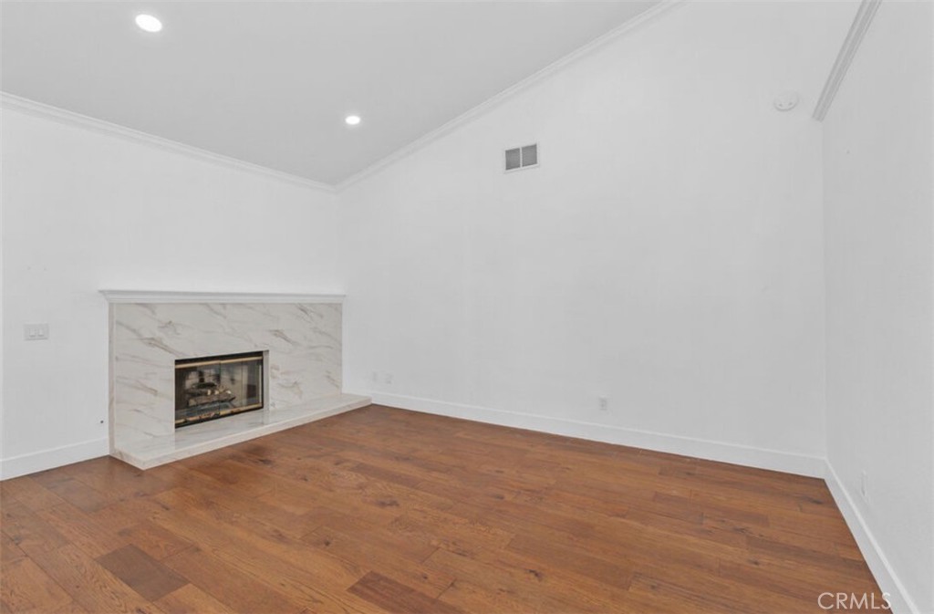 30894 Wellington Circle Temecula, CA 92591 - Photo 7 of 28 a view of an empty room and fire place
