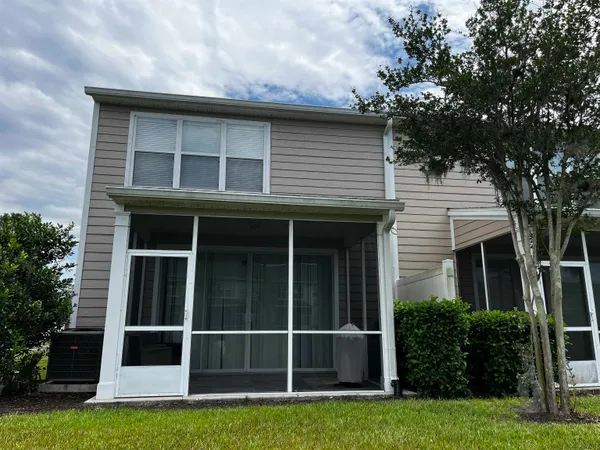 a view of house with front yard