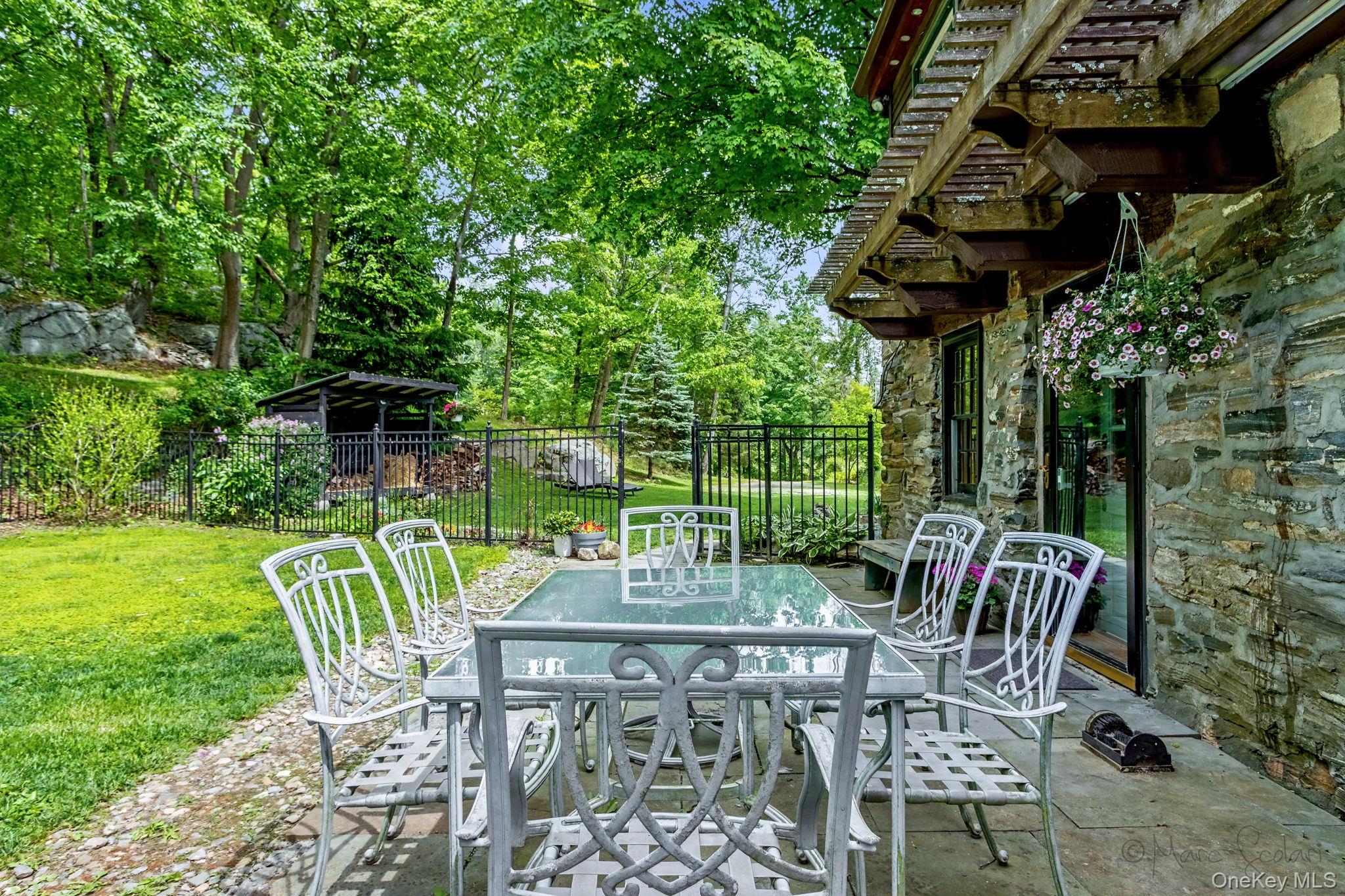 168 Old Rte 55 Pawling, NY 12564 - Photo 26 of 43 a view of patio with table and chairs and potted plants