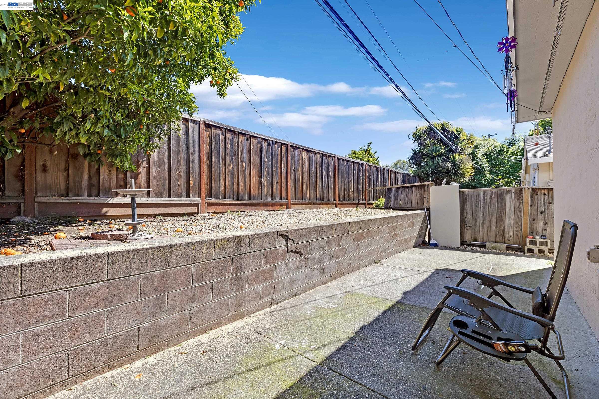 30236 Vanderbilt Street Hayward, CA 94544 - Photo 17 of 46 a view of a backyard with a patio and wooden fence