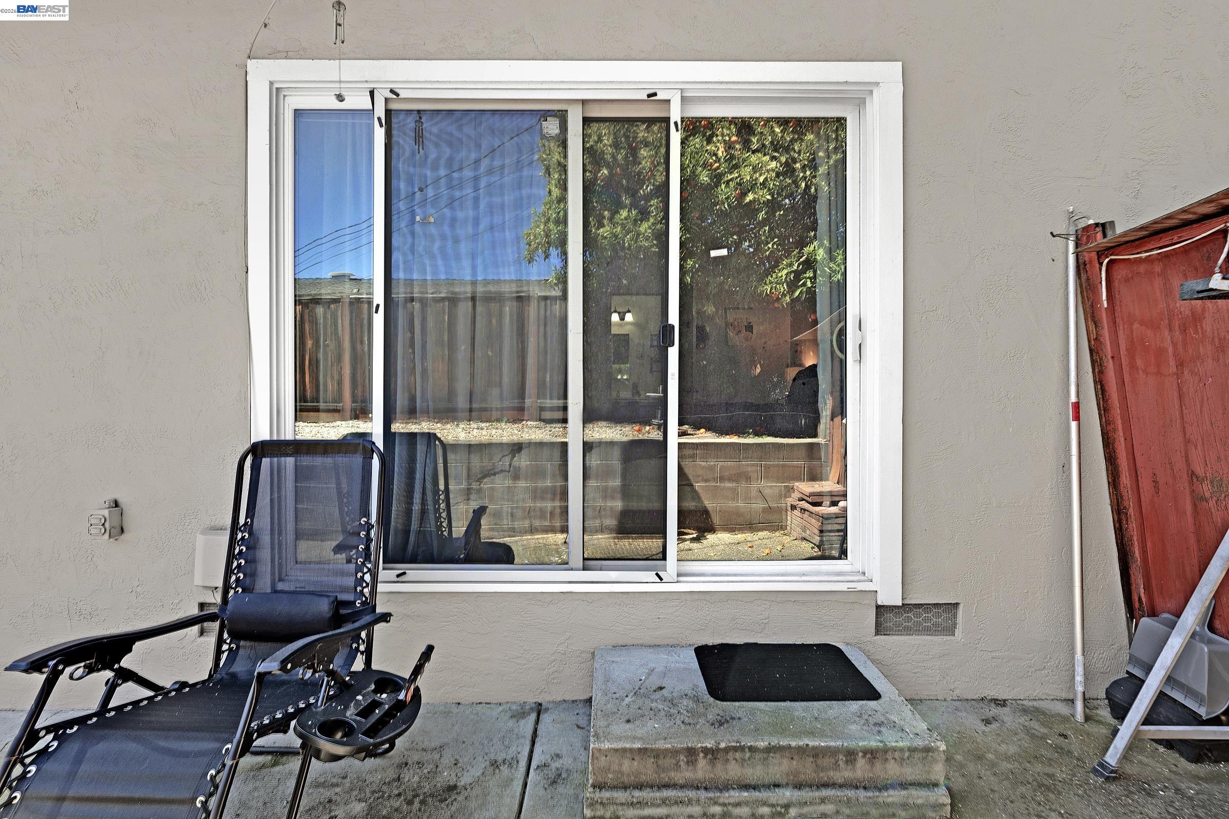 30236 Vanderbilt Street Hayward, CA 94544 - Photo 19 of 46 a view of a balcony with chair and front door