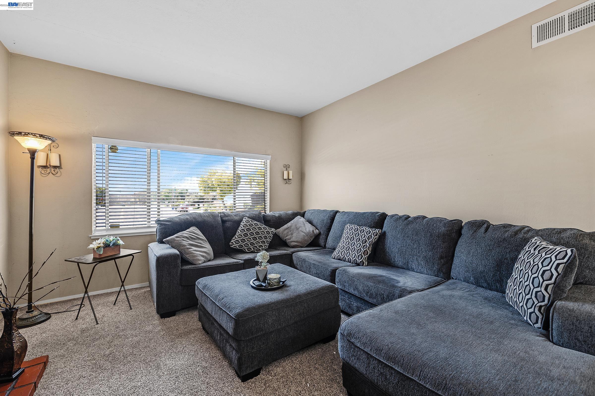 30236 Vanderbilt Street Hayward, CA 94544 - Photo 38 of 46 a living room with furniture and a large window