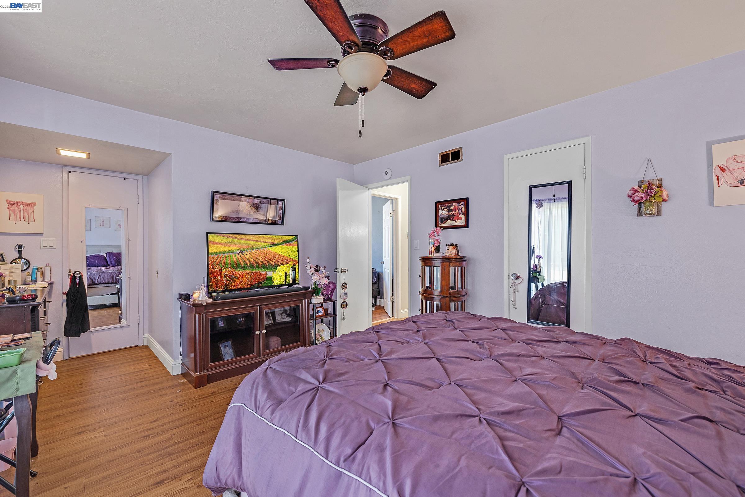 30236 Vanderbilt Street Hayward, CA 94544 - Photo 4 of 46 a bedroom with a bed and a flat screen tv