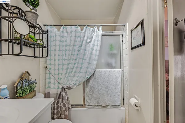 a bathroom with a sink and mirror